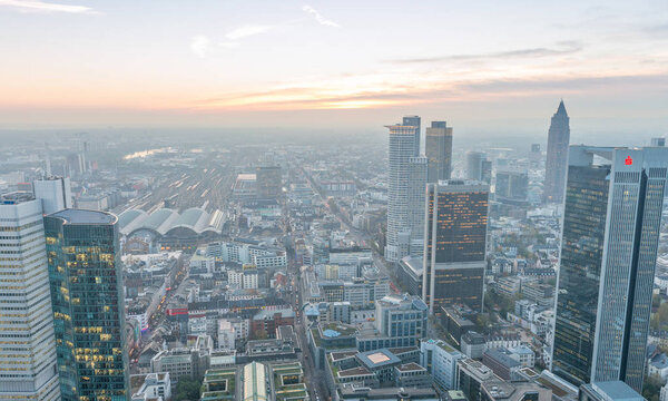 FRANKFURT, GERMANY - OCTOBER 31, 2013: Aerial view of city skyline at dusk. Frankfurt attracts 5 million visitors every year.