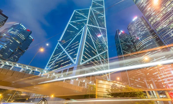 HONG KONG - MAY 12, 2014: Downtown skyscrapers with road car lig — Stock Photo, Image