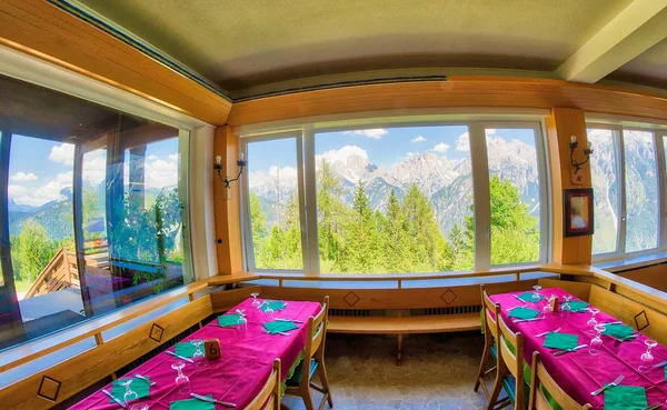 Hut on the Alps. View of mountains from the interior — Stock Photo, Image