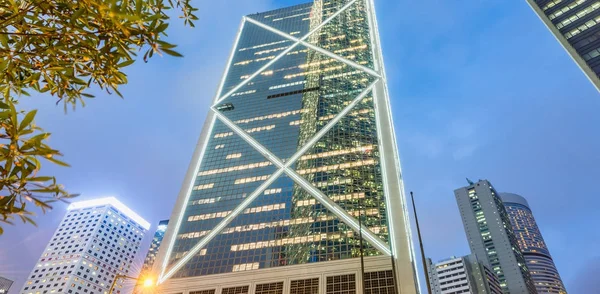 Central skyscrapers with road car light trails at night, Hong Ko — Stock Photo, Image