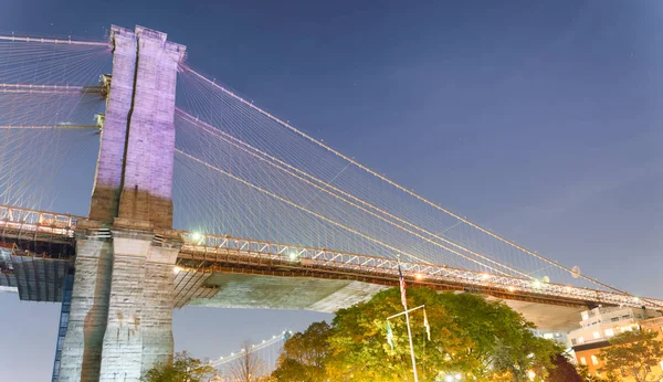 Night view of Brooklyn Bridge in New York City.