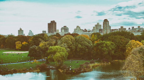 Trees and buildings in Central Park, autumn season, New York