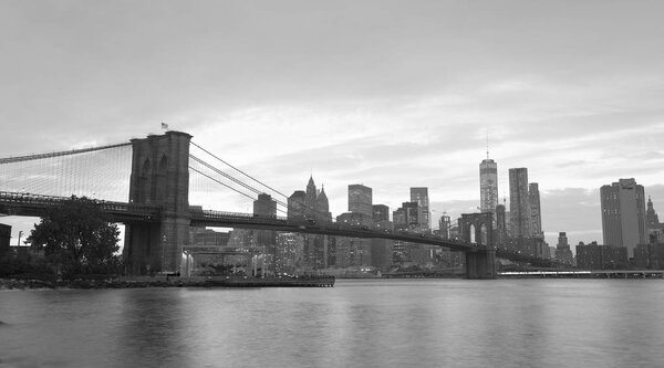 NEW YORK CITY - OCTOBER 25, 2015: Downtown Manhattan from Brooklyn Bridge Park. The city attracts 50 million people every year.