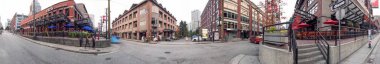 VANCOUVER, CANADA - AUGUST 9, 2017: Panoramic view of Yaletown buildings. Vancouver attracts 20 million people annually. clipart
