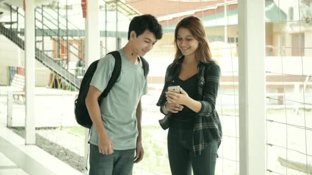 Couple Teenagers Talking Smartphone School Hallway — Stock Video