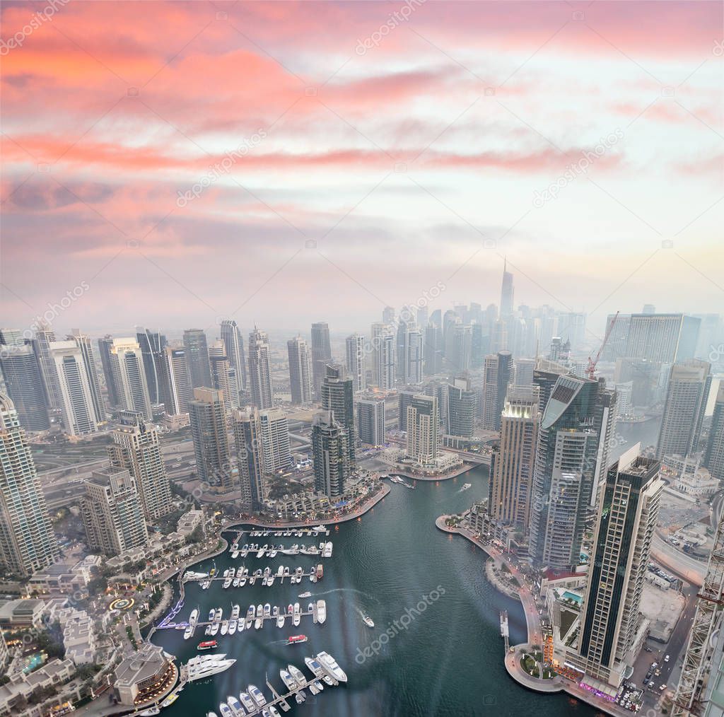 Aerial view of Dubai Marina buildings at dusk