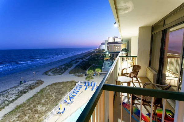 Beautiful balcony with ocean view at night — Stock Photo, Image