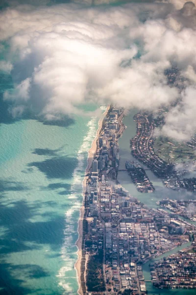 Aerial view of Miami Beach from airplane window.