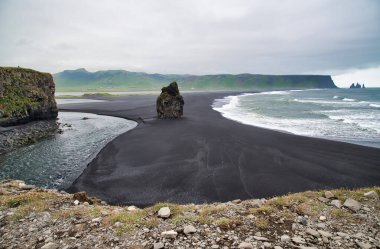 Reynisfjara Black Beach on a cloudy summer morning, Iceland clipart