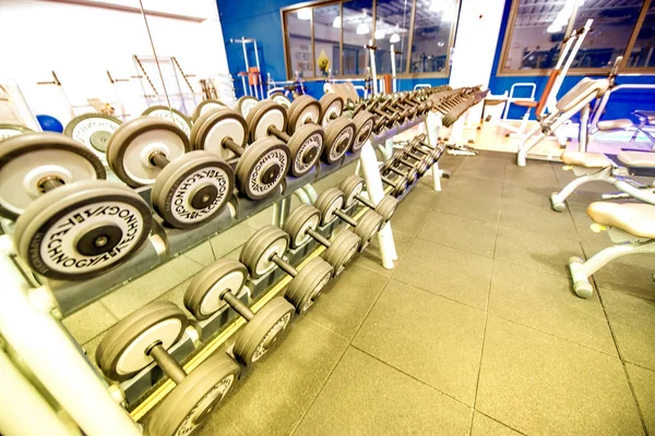 PISA - FEBRUARY 2017: Row of Technogym weights in a modern gym — Stock Photo, Image