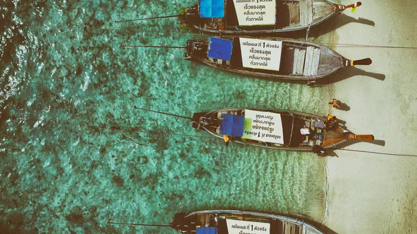 Aerial overhead view of Long Tail Boats of Thailand