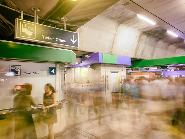 Tourists in the airport terminal, blurred view with fast moving — Stock Photo, Image