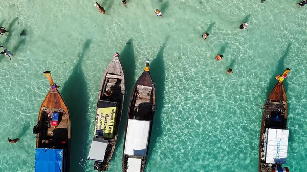Overhead aerial view of Long Tail Boats in Thailand