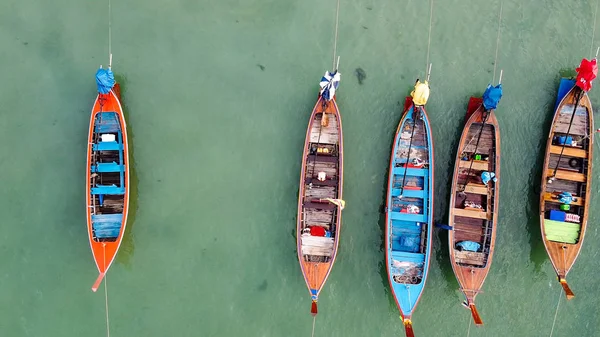 Wooden boats floating on the ocean. Aerial overhead view from dr — Stock Photo, Image