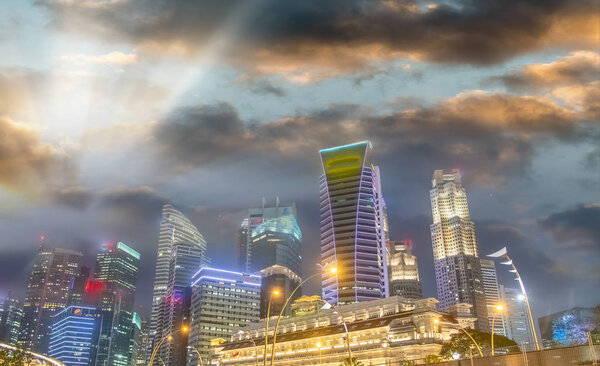 Singapore skyline in Marina Bay at sunset.
