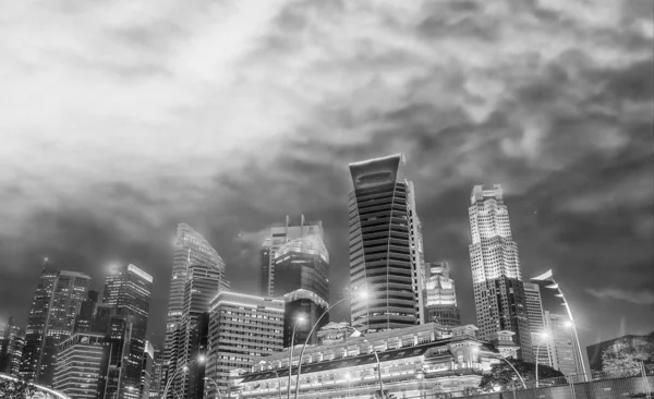 Singapore night skyline. Buildings along Marina Bay area