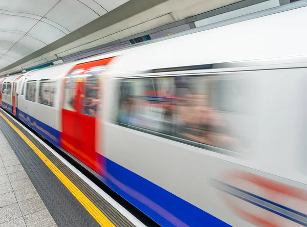 LONDON - JULY 3, 2015: Underground train inside the subway station.