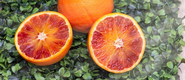 Sliced orange, fruit composition, close-up view.