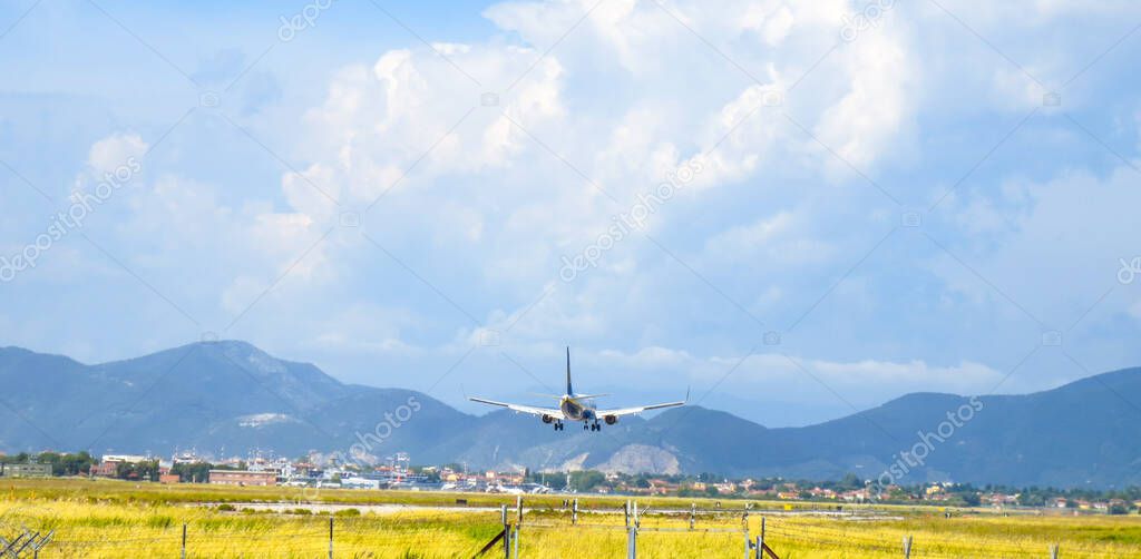 PISA, ITALY - JUN 1: Ryanair airplane lands in the main Tuscany airport, June 1, 2013 in Pisa, Italy. Ryanair is the major airplane low cost company in Europe.