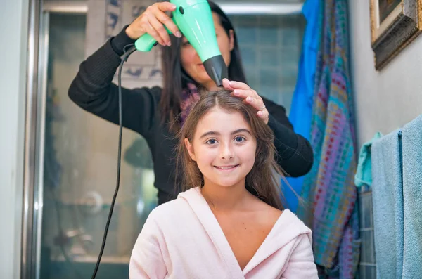 Young Mom Drying Daughter Hair Home — Stock Photo, Image