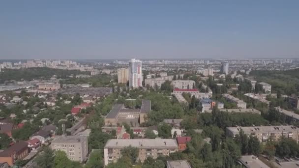 Aerial of the city at sunset. Summer evening, aerial photography of the city of Kiev, Darnitsky district. Metro Chernihiv. New architecture. Outskirts of the city new building shooting the drone. — Stock Video