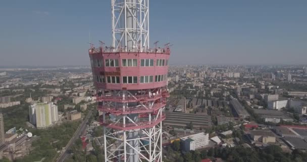 Aerial TV tower. TV tower in Kiev Close to residential buildings and highway.Digital television broadcasting and surveillance Tower restaurant city skyline Kiev, Ukraine. Summer sunny day. — Stock Video