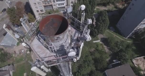 Aerial TV tower. TV tower in Kiev Close to residential buildings and highway.Digital television broadcasting and surveillance Tower restaurant city skyline Kiev, Ukraine. Summer sunny day. — Stock Video