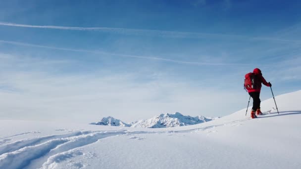 Man Walking Snow Mountain Clear Sky Winter Season Red Jacket — Stock Video