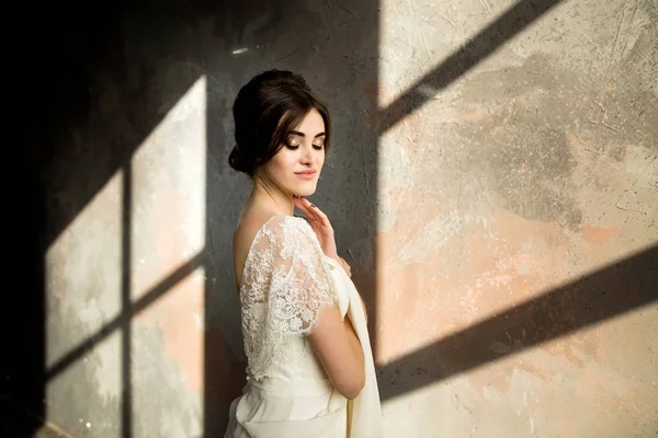 Portrait of beauty bride in white dress.