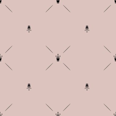 Pastel pembe bir arka plan üzerinde siyah kron şekli