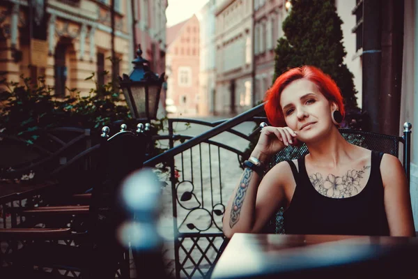 Red hair young woman walking on the old streets of Cracow, Poland — Stock Photo, Image
