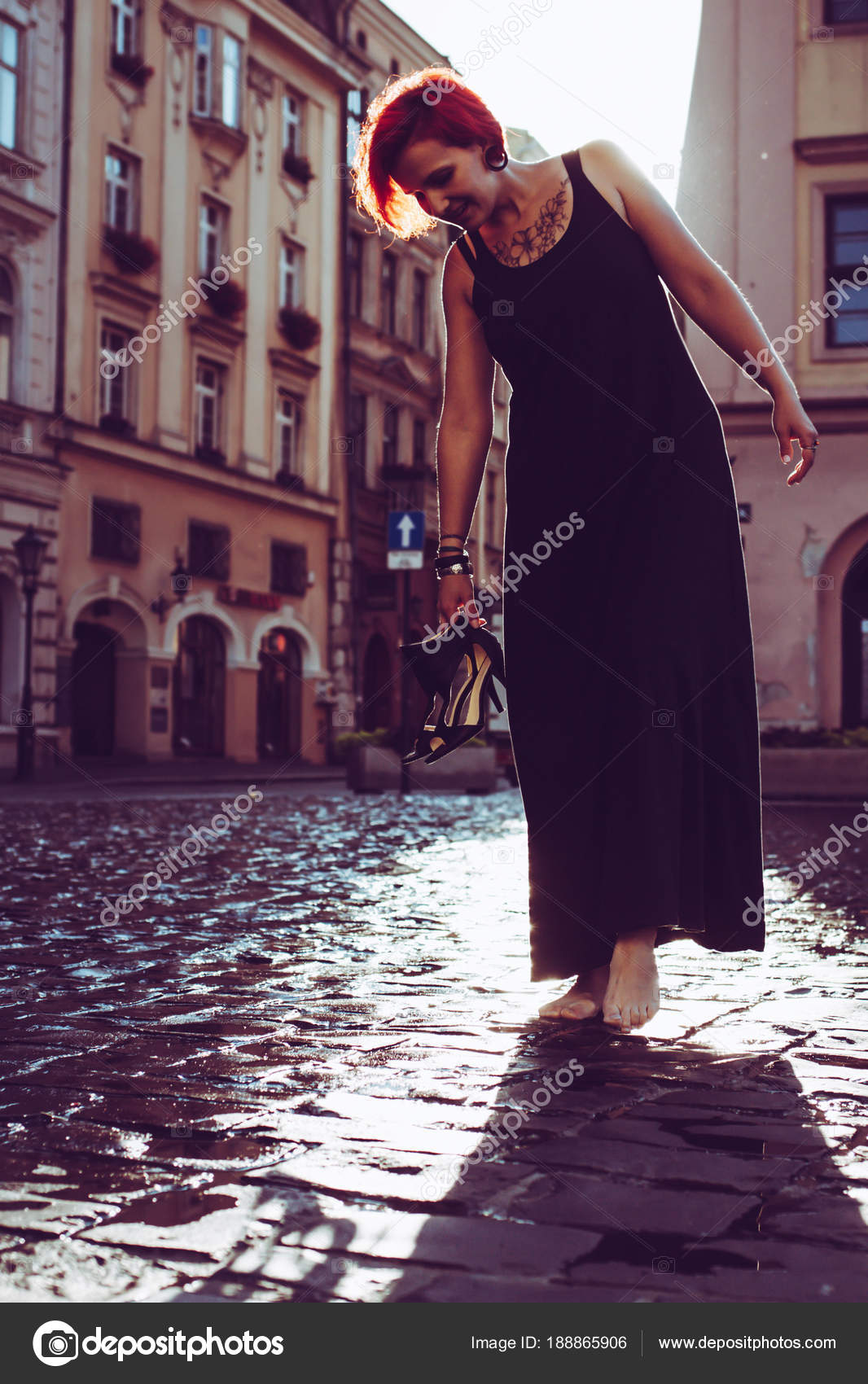 https://st3.depositphotos.com/1001194/18886/i/1600/depositphotos_188865906-stock-photo-red-hair-young-woman-walking.jpg