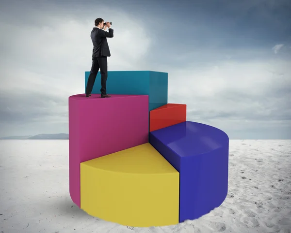 Businessman looks at the economic future — Stock Photo, Image