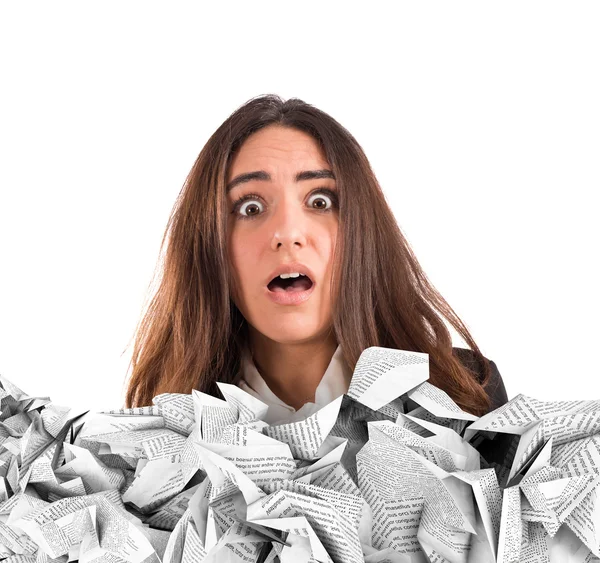 Businesswoman submerged by the working documents — Stock Photo, Image