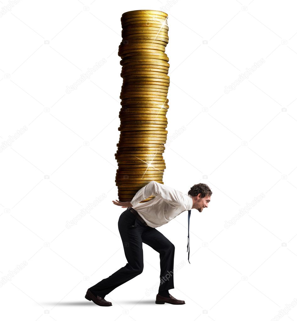 Businessman carries  stack of coins