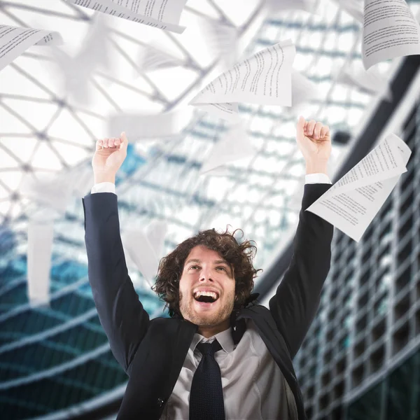 Businessman throwing sheets — Stock Photo, Image