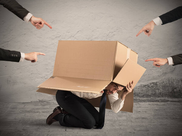 Businessman indicated by colleagues 