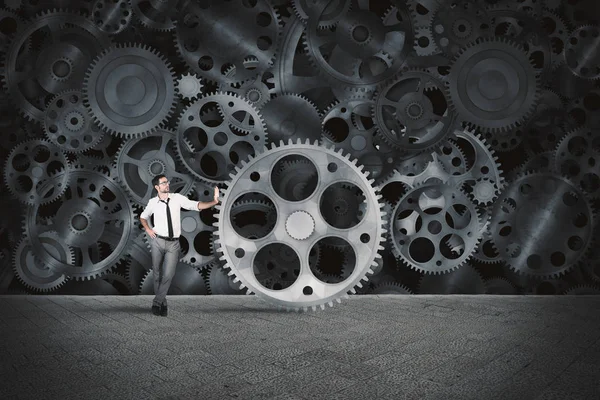 Businessman builds a business system — Stock Photo, Image