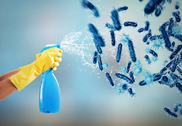 Housewife cleans with much cleaner spray — Stock Photo, Image