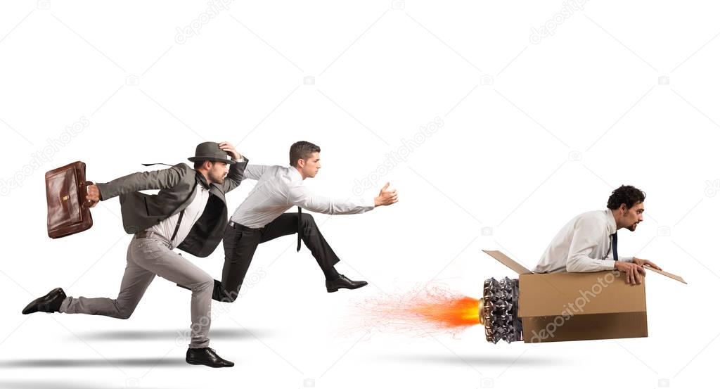 Businessman with cardboard missile overcomes