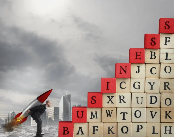 Businessman with missile wants to climb — Stock Photo, Image