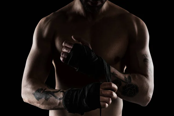 Boxer putting tapes on hands — Stock Photo, Image