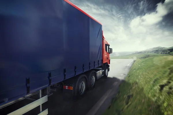 Blue truck on the road — Stock Photo, Image