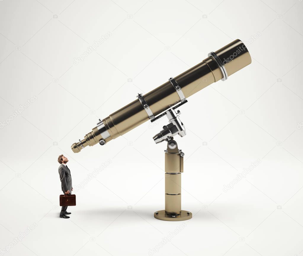 Little businessman looks in telescope 