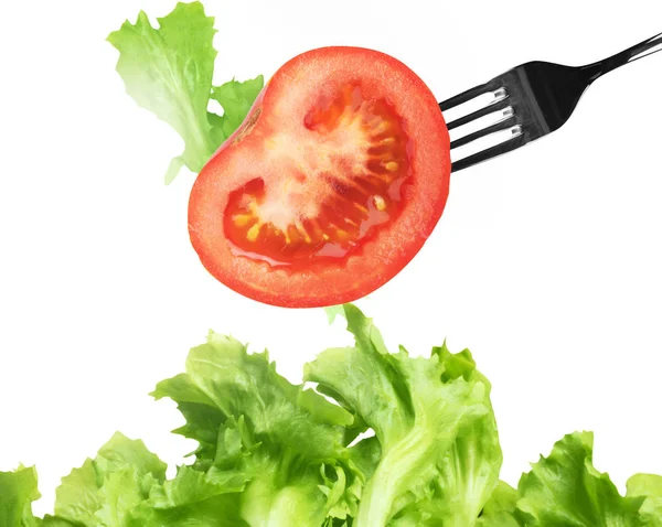 Mixed salad eaten with a fork — Stock Photo, Image