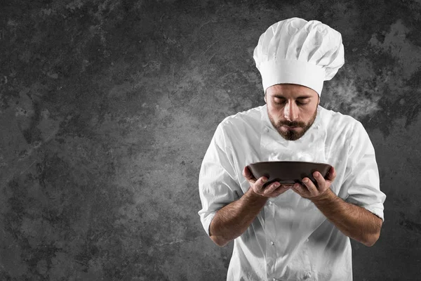 Man chef smelling the aroma — Stock Photo, Image