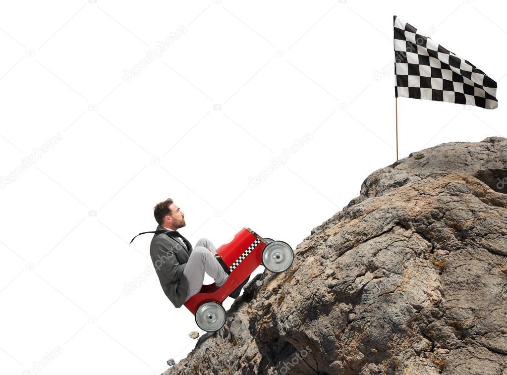 Businessman climbing  a mountain