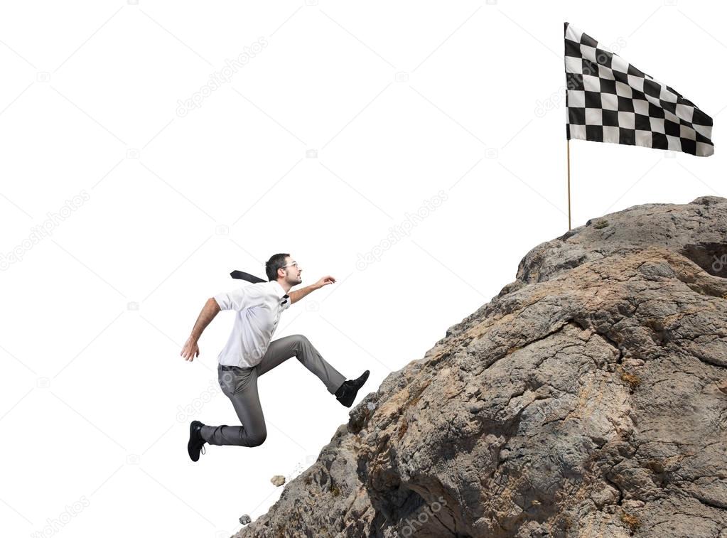 Businessman climbs a mountain 