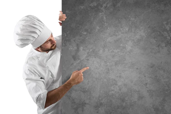 Chef showing and indicates his menu — Stock Photo, Image