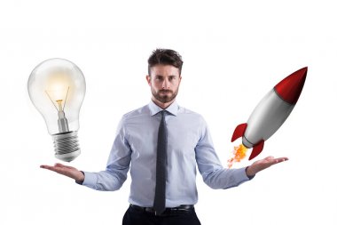 Businessman compares a lightbulb to a rocket